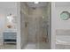 Bathroom featuring a tiled shower, stylish vanity, and a separate tub for a spa-like experience at 3518 Travis Ct, Chapel Hill, NC 27516