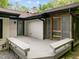 A charming outdoor deck area with built-in benches perfect for relaxing and enjoying the outdoors at 3518 Travis Ct, Chapel Hill, NC 27516