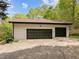 Attached two-car garage with ample parking space and a well-maintained exterior at 3518 Travis Ct, Chapel Hill, NC 27516