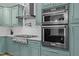 Modern kitchen with stainless steel appliances and granite countertops at 3518 Travis Ct, Chapel Hill, NC 27516