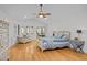 Bedroom with hardwood floors, sitting area, vaulted ceiling and natural light at 3518 Travis Ct, Chapel Hill, NC 27516