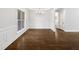 Dining room with hardwood floors, a modern chandelier, and ample natural light at 3638 Pine Needles Dr, Wake Forest, NC 27587