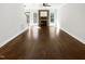 Spacious living room featuring hardwood floors, a fireplace and a ceiling fan at 3638 Pine Needles Dr, Wake Forest, NC 27587