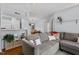 Inviting living room featuring a comfortable sectional sofa and an open layout to the dining area at 3805 Chimney Ridge Pl # 003, Durham, NC 27713