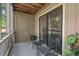 Relaxing outdoor patio featuring privacy door and sliding glass door at 3805 Chimney Ridge Pl # 003, Durham, NC 27713