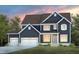 New construction home with a two-car garage, covered porch, beautiful lawn and professional landscaping at 382 Belmont Stakes Ln, Wendell, NC 27591