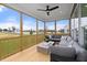 Spacious screened porch offers a tranquil outdoor living space with views of the surrounding neighborhood at 382 Belmont Stakes Ln, Wendell, NC 27591