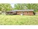 Brick home with a spacious backyard and a covered porch for outdoor entertaining at 428 Mitchell Ave, Franklinton, NC 27525
