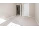 Bedroom featuring neutral walls, carpeted floors and a doorway to another room at 4901 Rose Quartz Way, Raleigh, NC 27610