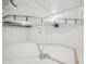 Clean basement with bright white walls and ceiling pipes at 511 Circle Dr, Burlington, NC 27215