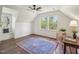 Bedroom featuring a ceiling fan, hardwood floors, bright windows, and a desk at 511 Circle Dr, Burlington, NC 27215