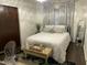 Serene main bedroom with plush bed, and elegant furnishings at 513 Orange St, Oxford, NC 27565