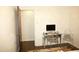 Bright office space with modern clear desk and chair, perfect for a home workspace at 513 Orange St, Oxford, NC 27565