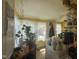 Bright kitchen features large windows, yellow walls, and an eclectic assortment of decor and natural light at 5138 Nc 56, Franklinton, NC 27525