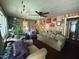 Cozy living room with wood paneling and vintage decor details at 5138 Nc 56, Franklinton, NC 27525