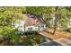 Bird's eye view of a home showcasing lush, green trees, lawn and parking spaces at 541 Oak Run Dr, Raleigh, NC 27606