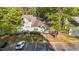 Overhead view of a home featuring a visitor parking area near mature shade trees at 541 Oak Run Dr, Raleigh, NC 27606