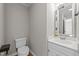 Half bathroom featuring a toilet and sink at 541 Oak Run Dr, Raleigh, NC 27606