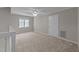 Spacious bedroom with neutral carpet, window, and ceiling fan at 541 Oak Run Dr, Raleigh, NC 27606
