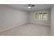 Cozy bedroom with a ceiling fan, neutral paint, and a window at 541 Oak Run Dr, Raleigh, NC 27606