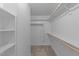 Walk-in closet with built-in shelving and ample storage space at 541 Oak Run Dr, Raleigh, NC 27606