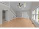 Spacious living room with hardwood floors and staircase to the second floor at 541 Oak Run Dr, Raleigh, NC 27606