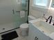 Modern bathroom featuring white subway tile shower, updated vanity, and stylish fixtures at 5531 Autry Rd, Rocky Mount, NC 27803