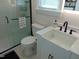 The bathroom has a large glass enclosed shower and updated vanity at 5531 Autry Rd, Rocky Mount, NC 27803