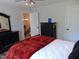 This bedroom has a view of the hallway, hardwood floors and dark wooden furniture at 5531 Autry Rd, Rocky Mount, NC 27803