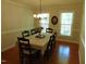 Charming dining area with abundant natural light and traditional-style furniture at 5531 Autry Rd, Rocky Mount, NC 27803