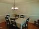Light and airy dining room with a table for six and wood flooring at 5531 Autry Rd, Rocky Mount, NC 27803