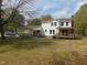 View of backyard with a fenced in yard and a two-story home at 5531 Autry Rd, Rocky Mount, NC 27803