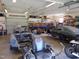 Spacious garage with multiple cars in progress and tools, offering ample workspace at 5531 Autry Rd, Rocky Mount, NC 27803