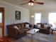 Spacious living room with neutral décor, hardwood floors, and comfortable seating at 5531 Autry Rd, Rocky Mount, NC 27803