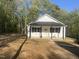 Charming new construction home with black shutters and covered front porch at 5875 Green Pine Rd, Cedar Grove, NC 27231