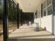 Inviting front porch with stately columns and a ceiling that offers shade and a peaceful spot to unwind outdoors at 5875 Green Pine Rd, Cedar Grove, NC 27231