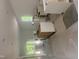Bright kitchen showing modern cabinets and window views during construction at 5875 Green Pine Rd, Cedar Grove, NC 27231