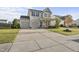 Beautiful two-story home with a well-kept lawn and a spacious driveway leading to a two-car garage at 624 S Kennelman Cir, Wendell, NC 27591