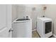 Convenient laundry room featuring a modern washer and dryer at 624 S Kennelman Cir, Wendell, NC 27591