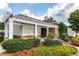 Charming clubhouse with a pergola entrance, stone accents, and colorful landscaping at 8721 Owl Roost Pl, Raleigh, NC 27617
