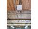 Exposed ceiling trusses and a wood ceiling are featured in this outbuilding at 919 E Main St, Haw River, NC 27258