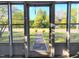 View from the front porch, showcasing the landscaped yard and quiet street at 919 E Main St, Haw River, NC 27258