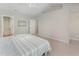 Spacious bedroom with neutral walls, a ceiling fan, and ample closet space at 9904 Erinsbrook Dr, Raleigh, NC 27617