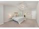 Inviting main bedroom featuring a high ceiling, a ceiling fan, and natural light at 9904 Erinsbrook Dr, Raleigh, NC 27617