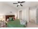 Cozy bedroom with unique decor, a ceiling fan, and ample space at 9904 Erinsbrook Dr, Raleigh, NC 27617