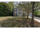 Charming two-story home features a manicured front yard and attached garage at 9904 Erinsbrook Dr, Raleigh, NC 27617