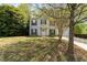 Charming two-story home features a manicured front yard and attached garage at 9904 Erinsbrook Dr, Raleigh, NC 27617