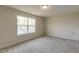 Bonus room with neutral carpet and large windows providing abundant light at 0 Hwy 86, Cedar Grove, NC 27231