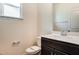 New powder room featuring a modern vanity with a white countertop and a view from the window at 0 Sawmill, Cedar Grove, NC 27231