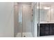 Modern bathroom featuring a glass shower with tile surround and built-in shelves at 0 Sawmill, Cedar Grove, NC 27231